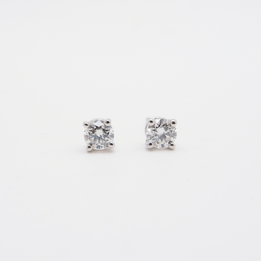 ティファニー ソリティア ダイヤモンド スタッド ピアス 0.49ct J-VVS1 ...